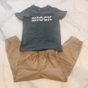 Dip, boys size SMALL 6-7,  green with white words "SHOOK " w/ blue stripe 🩵💚